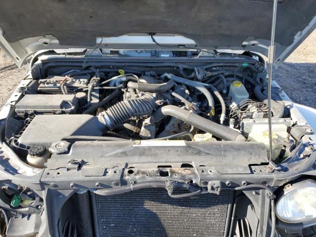 1J4HA5H1XBL549145 - 2011 JEEP WRANGLER U SAHARA SILVER photo 12