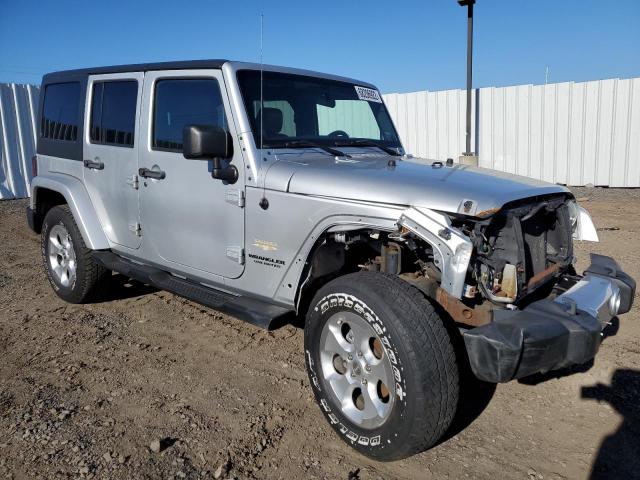 1J4HA5H1XBL549145 - 2011 JEEP WRANGLER U SAHARA SILVER photo 4