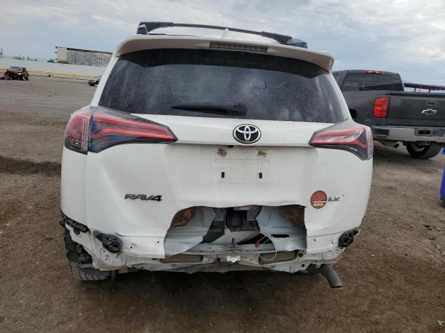 JTMZFREV0HJ720449 - 2017 TOYOTA RAV4 LE WHITE photo 6