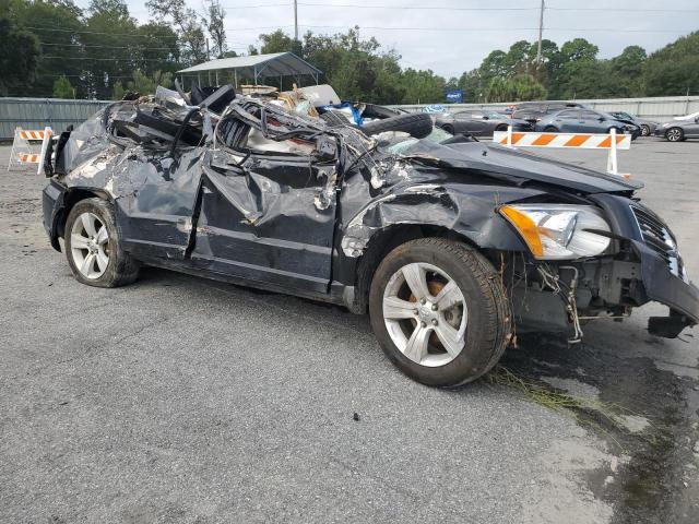 1B3CB3HA9AD550704 - 2010 DODGE CALIBER MAINSTREET BLACK photo 4