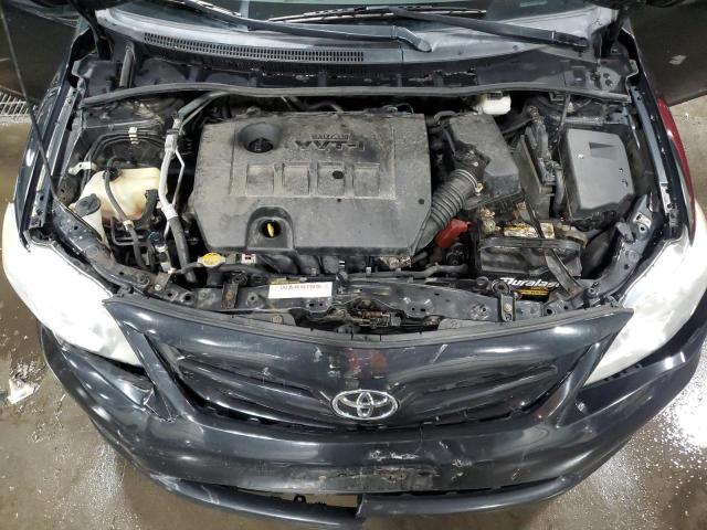 5YFBU4EE1CP055303 - 2012 TOYOTA COROLLA BASE Schwarz Foto 11