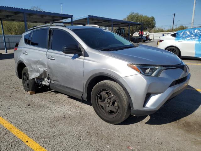 2T3ZFREV2HW398950 - 2017 TOYOTA RAV4 LE SILVER photo 4