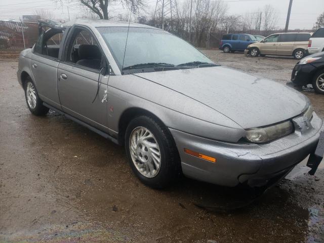 1G8ZK5273XZ112509 - 1999 SATURN SL2 SILVER photo 4