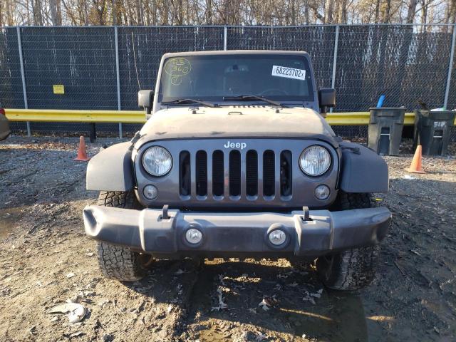 1C4BJWDG4GL337196 - 2016 JEEP WRANGLER U SPORT ნაცრისფერი ფოტო 5