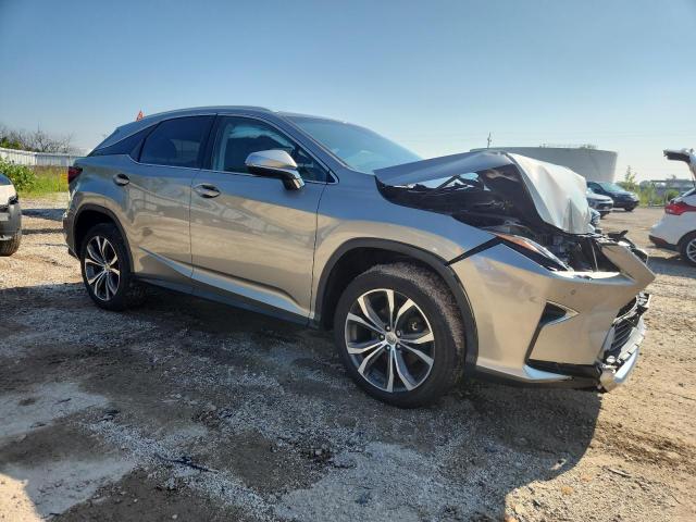 2T2BZMCA4HC108709 - 2017 LEXUS RX 350 BASE GRAY photo 4