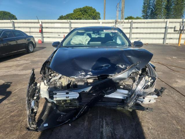 5YFEPMAEXMP198908 - 2021 TOYOTA COROLLA LE შავი ფოტო 5