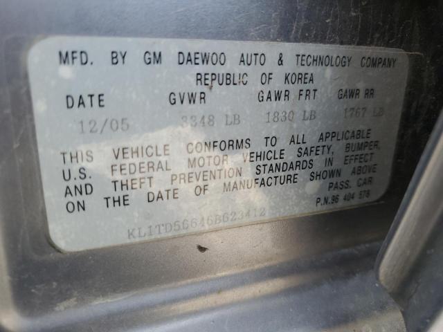 KL1TD56646B623412 - 2006 CHEVROLET AVEO BASE Gümüş foto 12