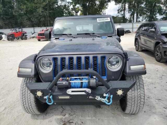 1C4JJXP64NW274472 - 2022 JEEP WRANGLER U SAHARA 4XE GRAY photo 5