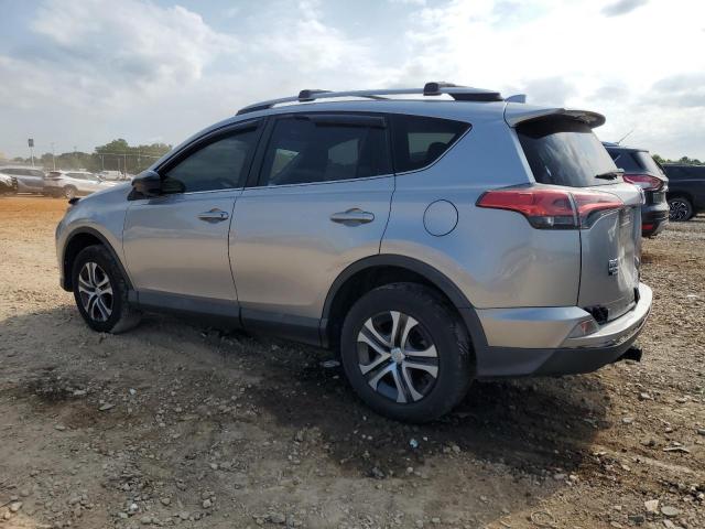 2T3ZFREV7HW346360 - 2017 TOYOTA RAV4 LE SILVER photo 2