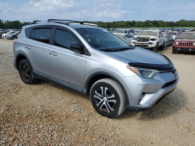 2T3ZFREV7HW346360 - 2017 TOYOTA RAV4 LE SILVER photo 4