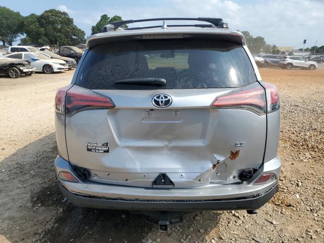 2T3ZFREV7HW346360 - 2017 TOYOTA RAV4 LE SILVER photo 6