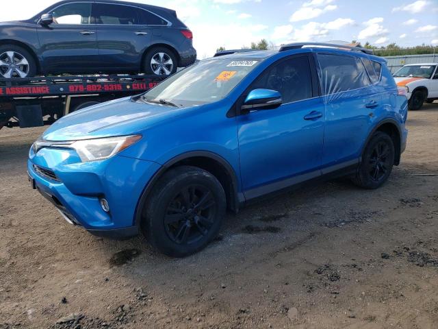 JTMRFREV3HJ129046 - 2017 TOYOTA RAV4 XLE BLUE photo 1