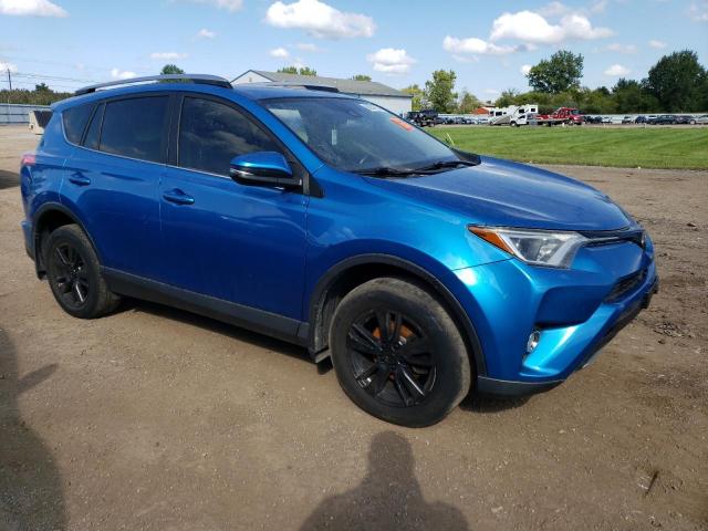 JTMRFREV3HJ129046 - 2017 TOYOTA RAV4 XLE BLUE photo 4