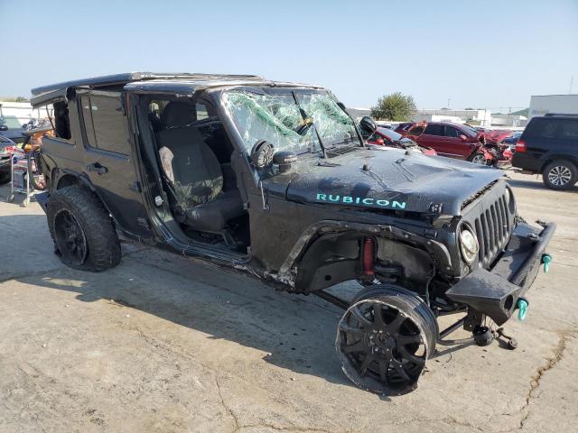 1J4HA6H16BL598462 - 2011 JEEP WRANGLER RUBICON BLACK photo 4