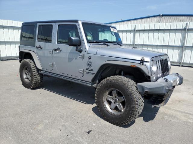 1C4BJWEG6FL560305 - 2015 JEEP WRANGLER U SAHARA SILVER photo 4