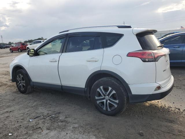 JTMBFREV4GD196690 - 2016 TOYOTA RAV4 LE WHITE photo 2