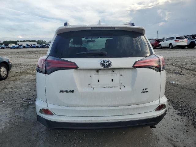 JTMBFREV4GD196690 - 2016 TOYOTA RAV4 LE WHITE photo 6