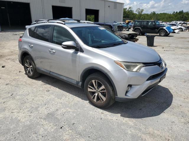 2T3WFREV0GW262883 - 2016 TOYOTA RAV4 XLE SILVER photo 4