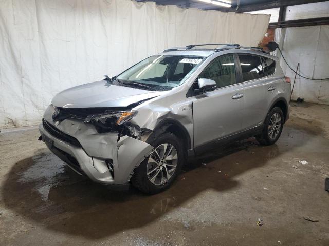 JTMRJREV9JD161132 - 2018 TOYOTA RAV4 HV LE SILVER photo 1