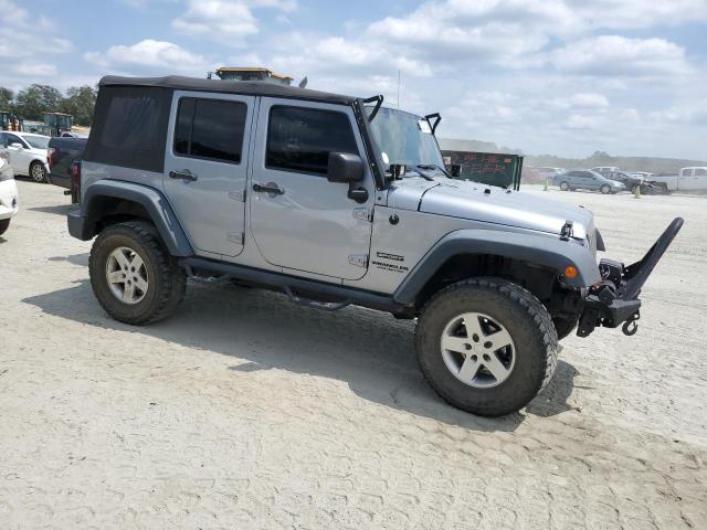 1C4BJWDG1FL611629 - 2015 JEEP WRANGLER U SPORT SILVER photo 4