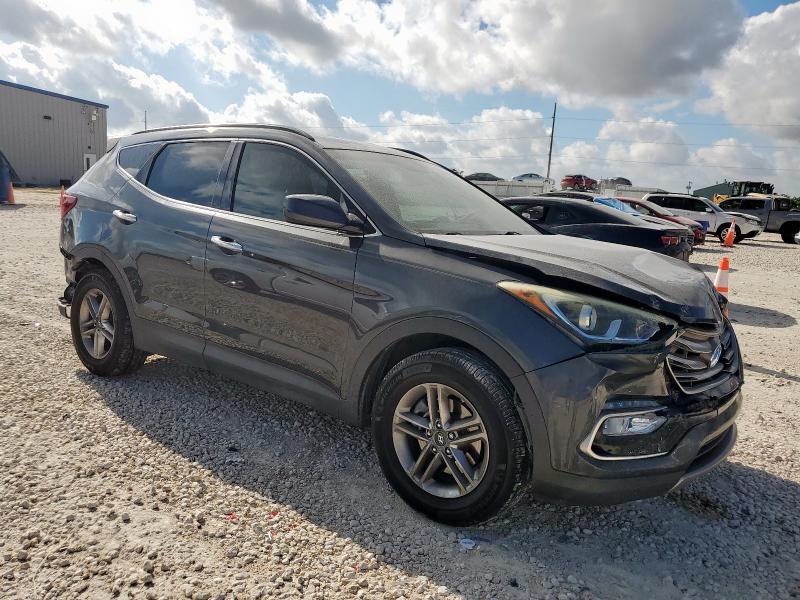 5XYZU3LB9HG417715 - 2017 HYUNDAI SANTA FE S GRAY photo 4