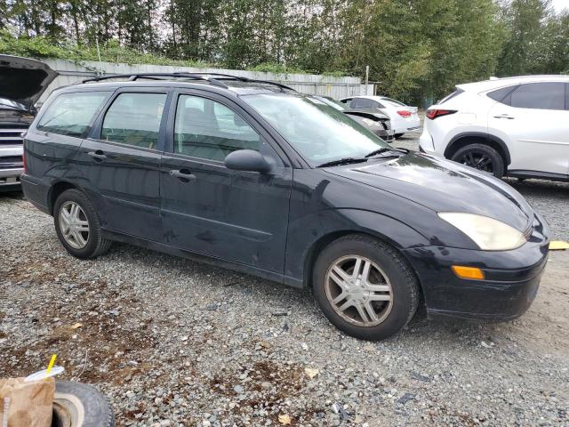 1FAHP36351W174622 - 2001 FORD FOCUS SE BLACK photo 4