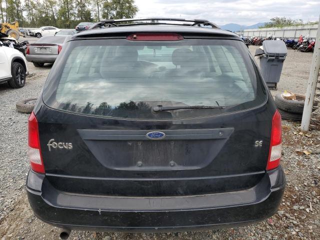 1FAHP36351W174622 - 2001 FORD FOCUS SE BLACK photo 6