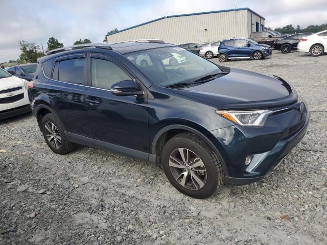 JTMWFREV4HD103833 - 2017 TOYOTA RAV4 XLE BLUE photo 4