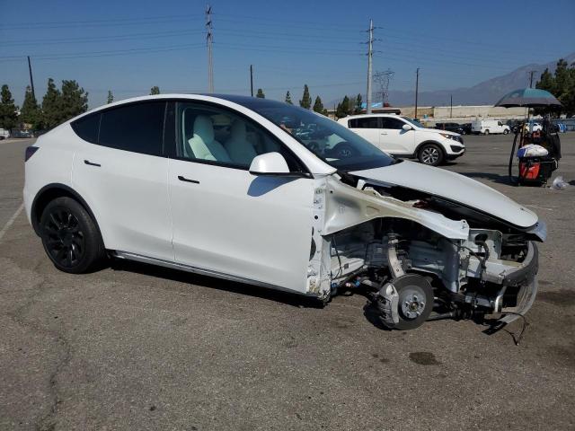 7SAYGDEEXNF534712 - 2022 TESLA MODEL Y WHITE photo 4