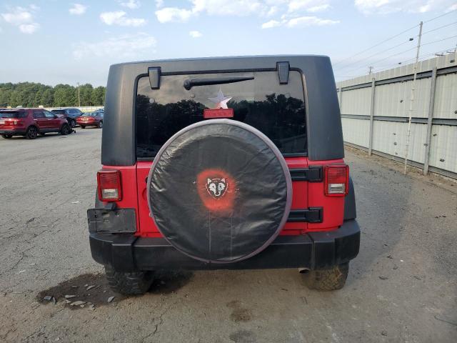 1J4GA391X9L708724 - 2009 JEEP WRANGLER U X RED photo 6