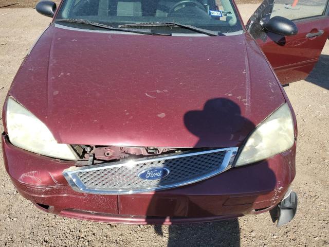 1FAFP37NX6W169169 - 2006 FORD FOCUS ZX5 MAROON photo 11