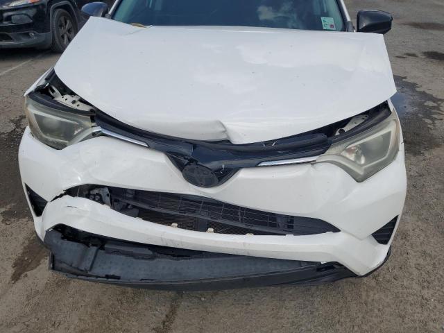 2T3ZFREV7GW235211 - 2016 TOYOTA RAV4 LE WHITE photo 12