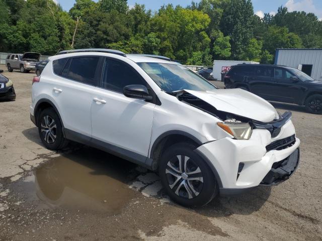 2T3ZFREV7GW235211 - 2016 TOYOTA RAV4 LE WHITE photo 4