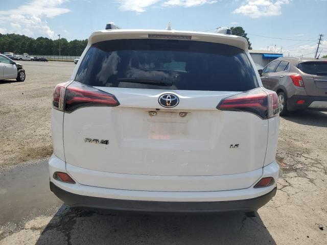 2T3ZFREV7GW235211 - 2016 TOYOTA RAV4 LE WHITE photo 6