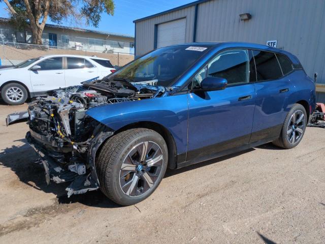 WB523CF03RCP83184 - 2024 BMW IX XDRIVE50 BLUE photo 1
