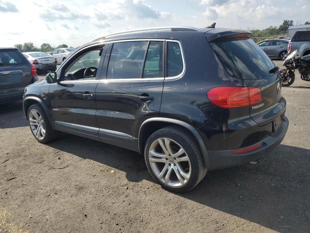 WVGAV3AX3DW564890 - 2013 VOLKSWAGEN TIGUAN S შავი ფოტო 2