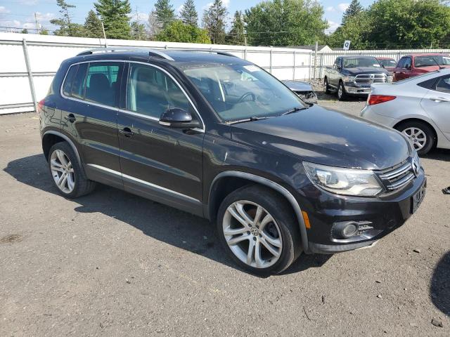 WVGAV3AX3DW564890 - 2013 VOLKSWAGEN TIGUAN S შავი ფოტო 4