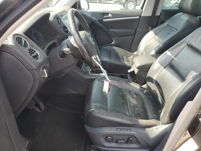 WVGAV3AX3DW564890 - 2013 VOLKSWAGEN TIGUAN S შავი ფოტო 7