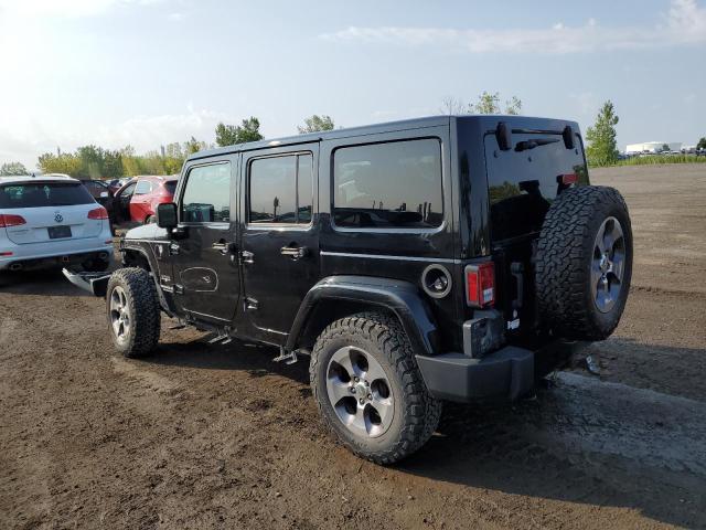 1C4BJWEG1GL262374 - 2016 JEEP WRANGLER U SAHARA შავი ფოტო 2