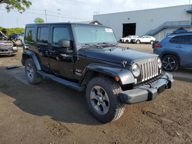 1C4BJWEG1GL262374 - 2016 JEEP WRANGLER U SAHARA შავი ფოტო 4