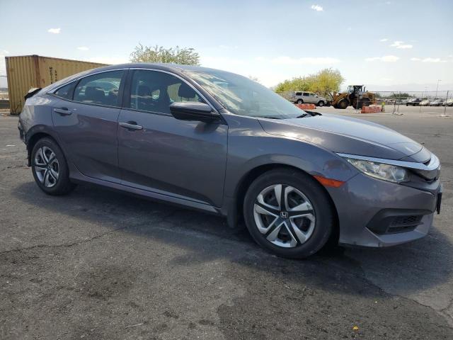 2HGFC2F54JH541423 - 2018 HONDA CIVIC LX ნაცრისფერი ფოტო 4