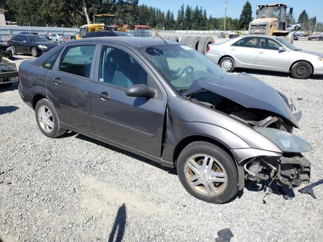 1FAFP34394W166439 - 2004 FORD FOCUS SE COMFORT GRAY photo 4