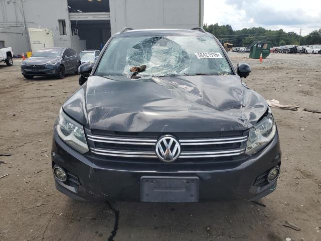 WVGAV7AX2HK012706 - 2017 VOLKSWAGEN TIGUAN S BLACK photo 5