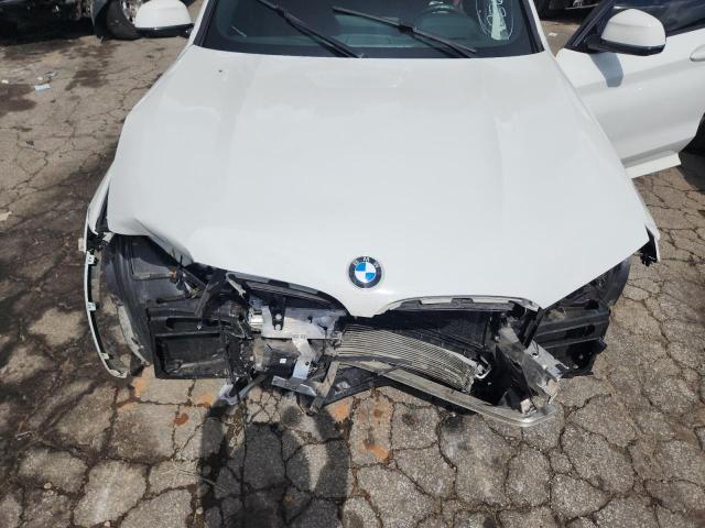 5UX33DT03P9P84797 - 2023 BMW X4 XDRIVE30I WHITE photo 12