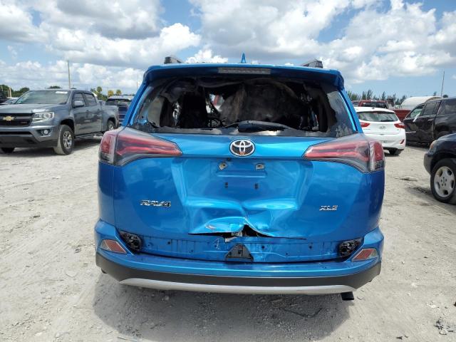 JTMWFREV6JJ206744 - 2018 TOYOTA RAV4 ADVENTURE BLUE photo 6