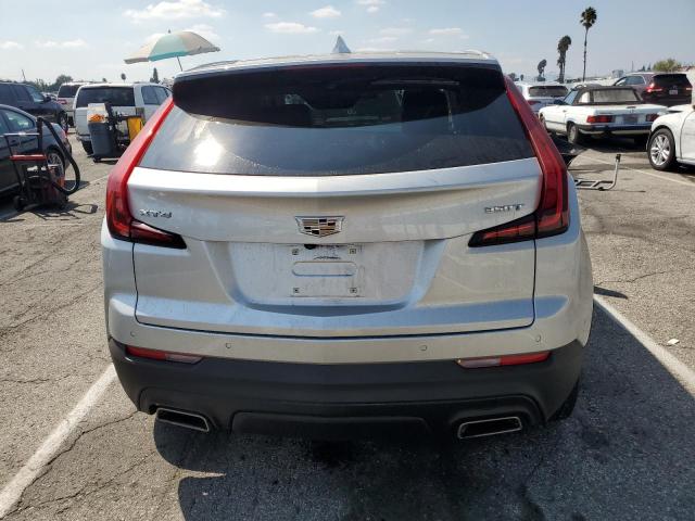 1GYAZAR46MF003049 - 2021 CADILLAC XT4 LUXURY SILVER photo 6