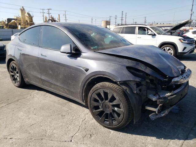 7SAYGDEEXNF350144 - 2022 TESLA MODEL Y GRAY photo 4