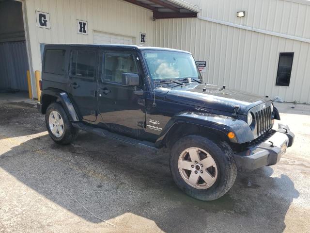 1C4BJWEG1CL179988 - 2012 JEEP WRANGLER UNLIMITED SAHARA შავი ფოტო 4