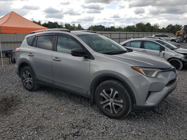 2T3ZFREV3JW433629 - 2018 TOYOTA RAV4 LE Մոխրագույն լուսանկար 4