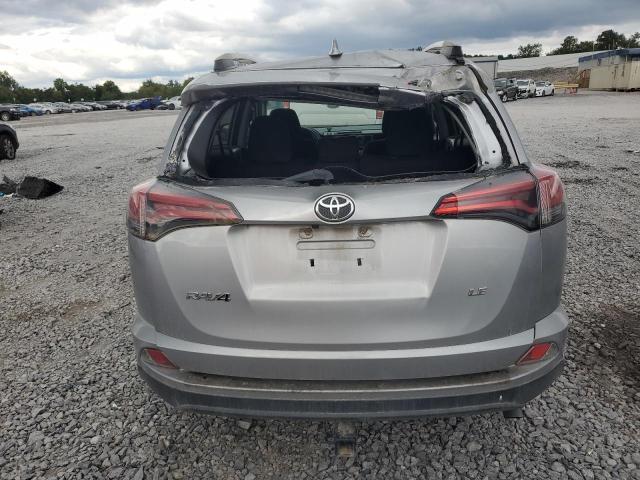 2T3ZFREV3JW433629 - 2018 TOYOTA RAV4 LE Մոխրագույն լուսանկար 6